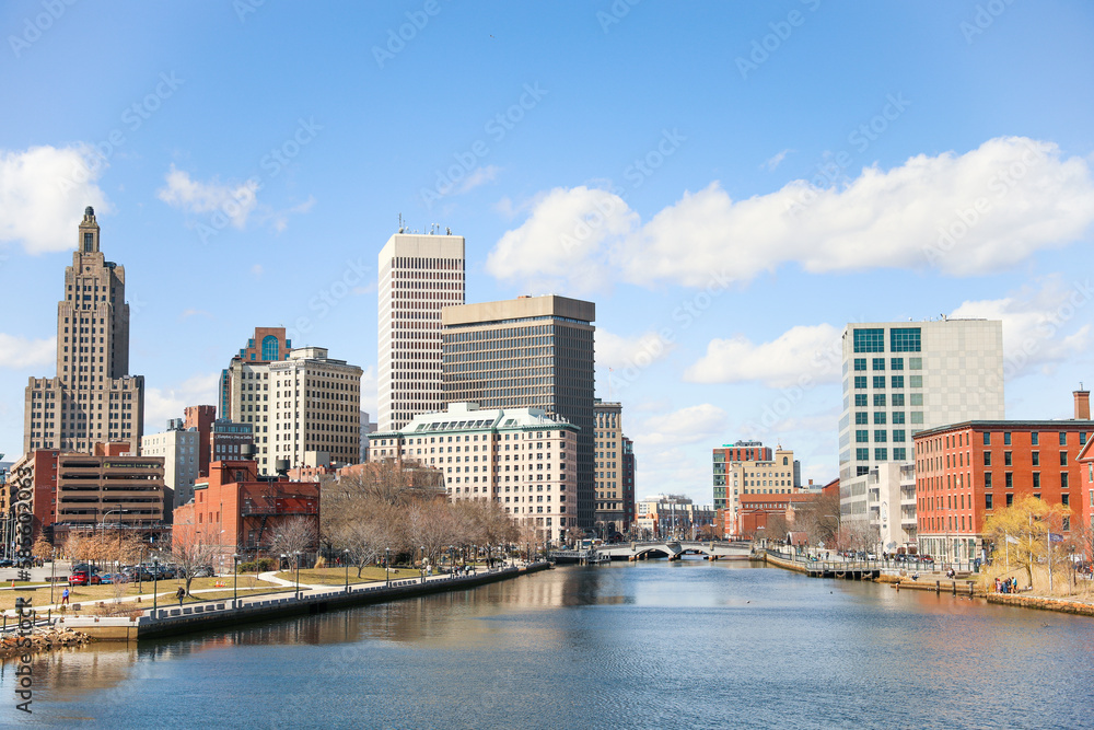 A view of Providence, Rhode Island showcasing a modern cityscape with towering skyscrapers, bustling streets and a thriving urban environment. A perfect representation of the modern metropolis.