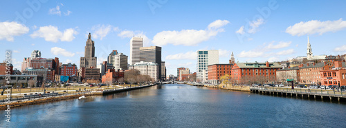 A view of Providence, Rhode Island showcasing a modern cityscape with towering skyscrapers, bustling streets and a thriving urban environment. A perfect representation of the modern metropolis. photo