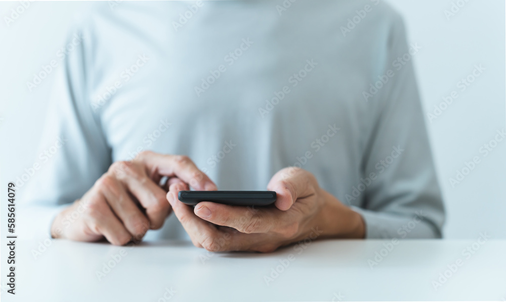 Man using social media application on smartphone for video, live streaming, meeting or conference online. Modern entertainment lifestyle and leisure via cyberspace technology like music and chat Man using social media application on smartphone for video, live streaming, meeting or conference online. Modern entertainment lifestyle and leisure via cyberspace technology like music and chat