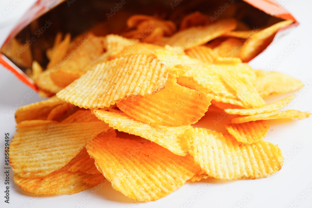 Potato chips in open bag, delicious BBQ seasoning spicy for crips, thin slice deep fried snack fast food. Potato chips in open bag, delicious BBQ seasoning spicy for crips, thin slice deep fried snack fast food.