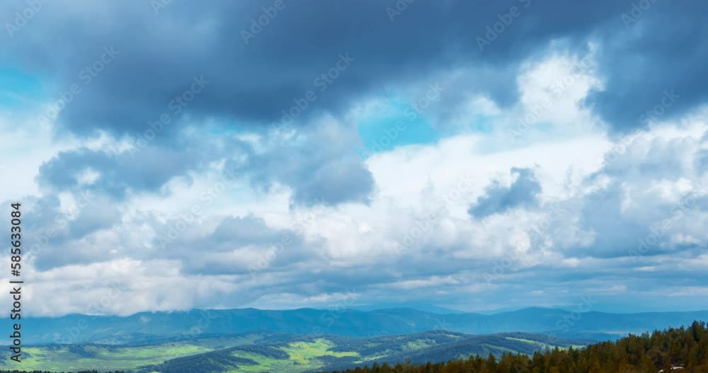 Mountain lake time-lapse at the summer or autumn time. Wild nature and rural field. Fast clouds movement, green grass and dramatic sky. Motorised dolly slider movement Mountain lake time-lapse at the summer or autumn time. Wild nature and rural field. Fast clouds movement, green grass and dramatic sky. Motorised dolly slider movement