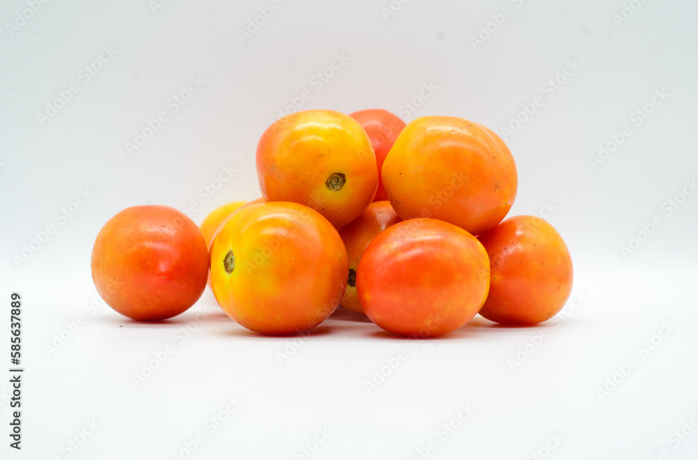 Pile of tomatoes on white background Pile of tomatoes on white background