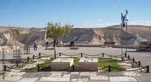 graves of David and Paula Ben Gurion overlook the magnificent Zin Valley wilderness near Sde Boker in Israel with a clear blue sky background
