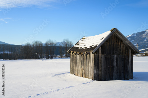 A small hut in a winter landscape
