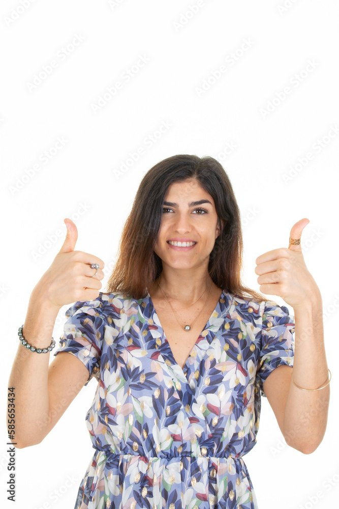 Young beautiful woman brunette success sign positive gesture with hand finger thumbs up on white background Young beautiful woman brunette success sign positive gesture with hand finger thumbs up on white background