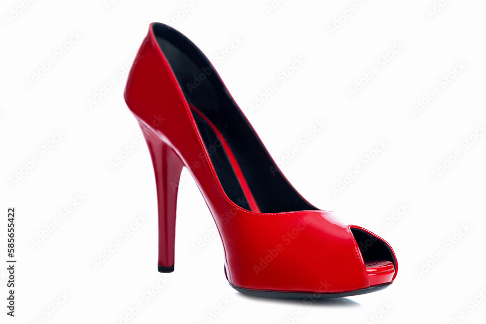 Elegant women's red shoes with high heels. Beauty and fashion. Close-up. Profile view. Isolated on white background. Elegant women's red shoes with high heels. Beauty and fashion. Close-up. Profile view. Isolated on white background.