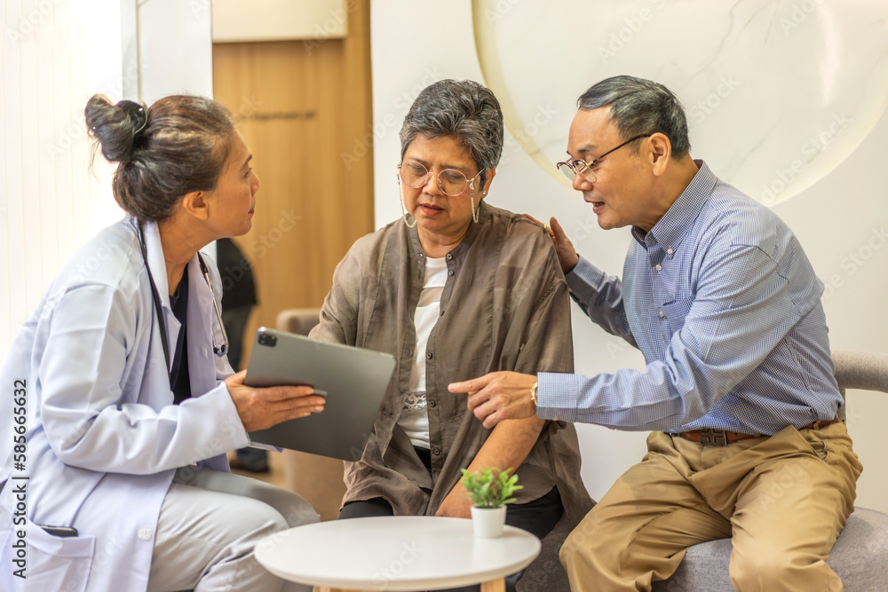 Woman doctor with stethoscope help support discussing and consulting care talk to sick senior asian woman patient in hospital,caregiver,elderly,recovery,illness insurance.healthcare and medicine Woman doctor with stethoscope help support discussing and consulting care talk to sick senior asian woman patient in hospital,caregiver,elderly,recovery,illness insurance.healthcare and medicine