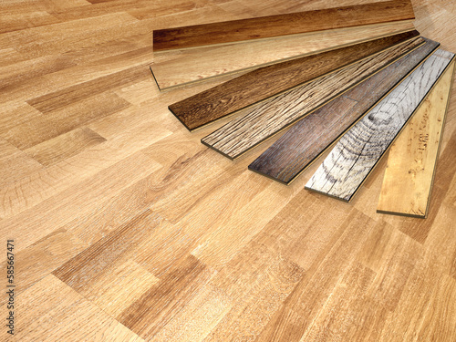 New parquet planks of different colors with different wood species on wooden floor