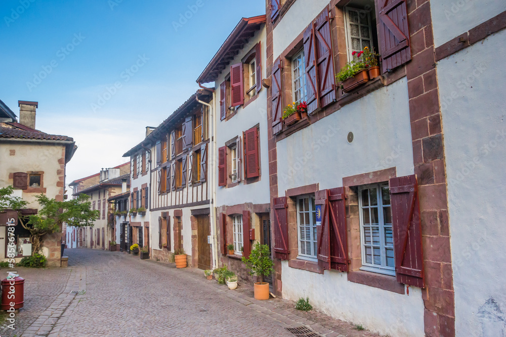 Old houses with shutters in the historic central street of Saint-Jean-Pied-de-Port, France