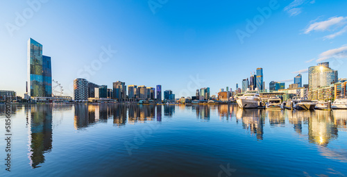 Panorama of Melbourne CBD Docklands buildings and Yarra river photo