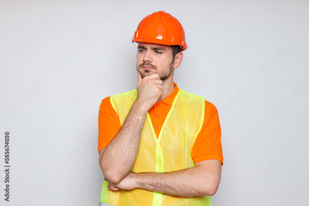 Young man civil engineer in safety hat Young man civil engineer in safety hat