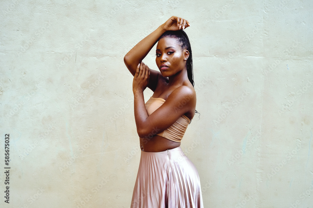 confident black woman with smooth skin looking at camera confident black woman with smooth skin looking at camera