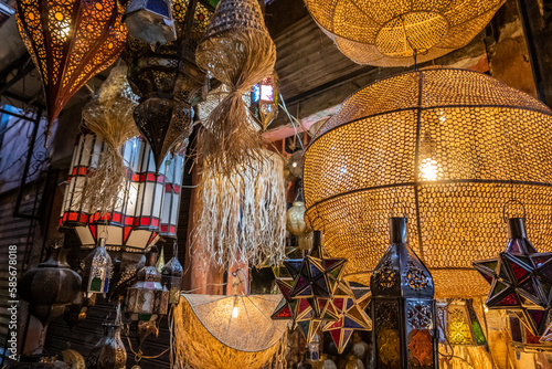 Colorful chandeliers for sale in a market in a souk in the Medina around the Jemaa el-Fnaa square in Marrakesh Morocco