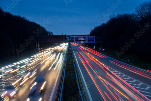 Germany, Bavaria, Long exposure of traffic on multiple lane highway at night