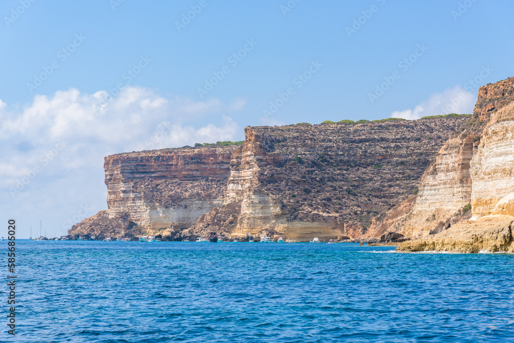 Limestone cliffs in the south coast of the island of Lampedusa, Sicily, Italy.