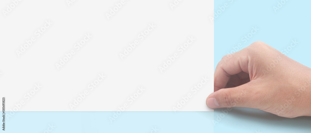 Hands holding paper blank for letter paper Hands holding paper blank for letter paper