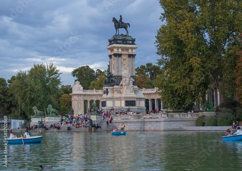 View of the beautiful lake in front of the Alfonso XII monument in the Retiro Park in Madrid.