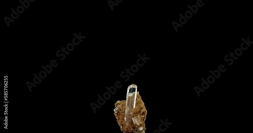 colorless gem quality topaz on matrice. macro detail texture background. close-up raw rough unpolished semi-precious gemstone