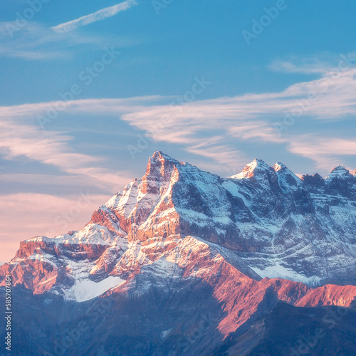 Sinrise or sunset panoramic view of the Dents du Midi in the Swiss Alps, canton Vaud, Switzerland