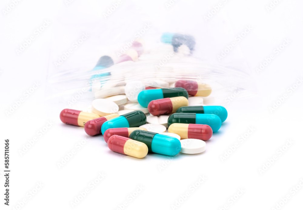 Colorful pills with capsules and pills in zip-lock plastic bags. isolated on white background Colorful pills with capsules and pills in zip-lock plastic bags. isolated on white background