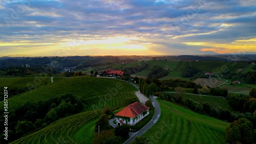 Aerial 4K drone footage of wine cottage Malek which lies in the in the hills northeast of Ormož in northeastern Slovenia. photo