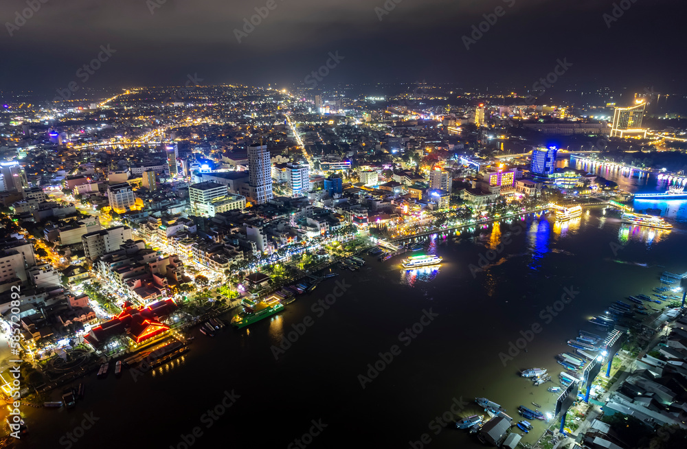 Can Tho city, Can Tho, Vietnam at night, aerial view. This is a large city in Mekong Delta, developing infrastructure, population, and agricultural product trading center of Vietnam