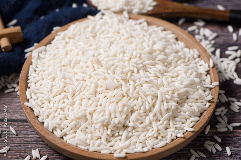 Organic raw sticky rice or glutinous rice on table Organic raw sticky rice or glutinous rice on table