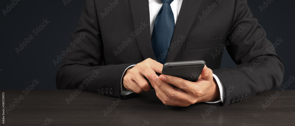 Man holding smartphone device and touching screen Man holding smartphone device and touching screen