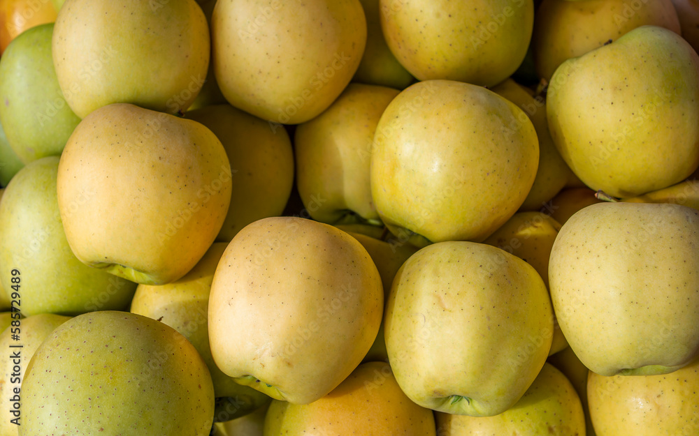 Fresh, organic green apples top view closeup. Sweet and juicy vegan food. Fresh, organic green apples top view closeup. Sweet and juicy vegan food.