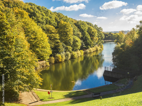 A view over the lower reservoir at Chellow Dene in Bradford District, where both residents and visitors enjoy the relaxing atmosphere of the woodland, waterways, songbirds, ducks and geese photo