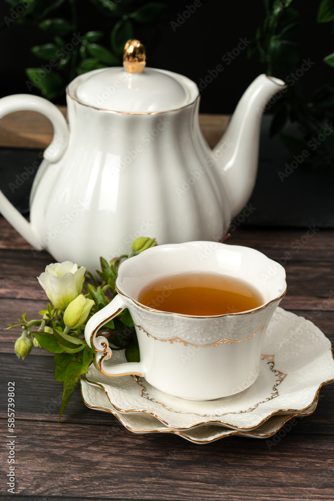 Fototapeta premium Pretty porcelain teacup with hibiscus tea