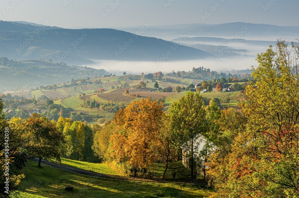 Autumn landscape with village, Slovakia. Tourism in nature, healthy lifestyle.