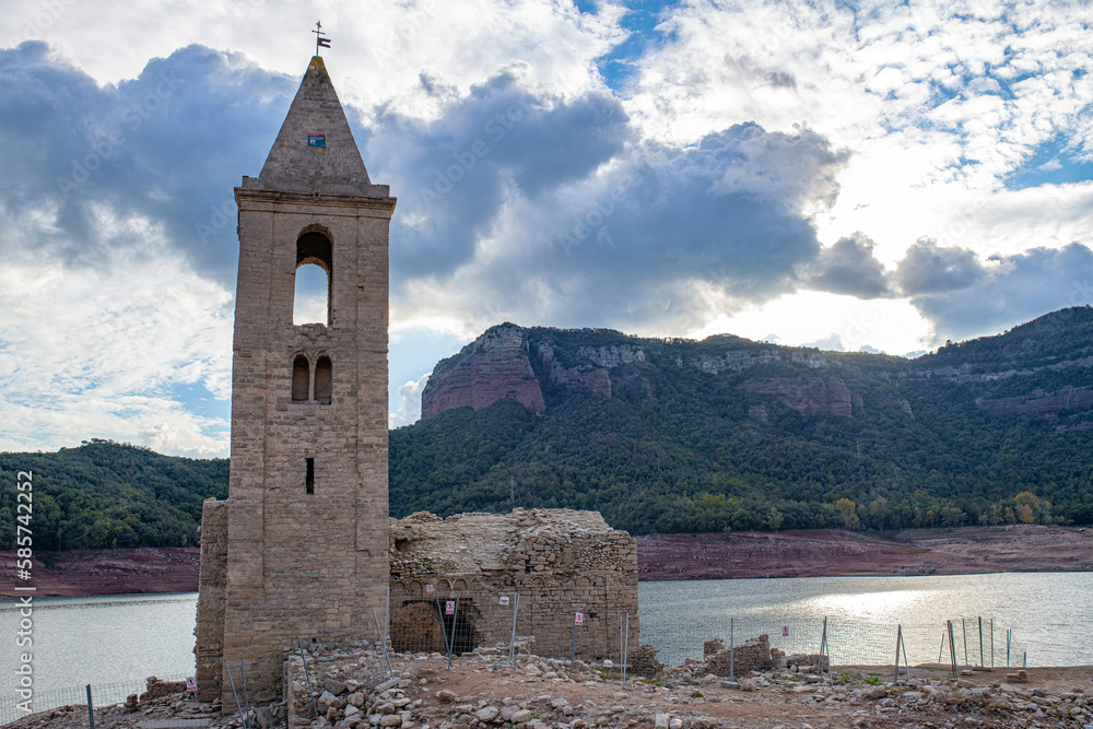 Sau reservoir very dry with little water and bell tower of San roman de Sau in Girona Catalonia Spain