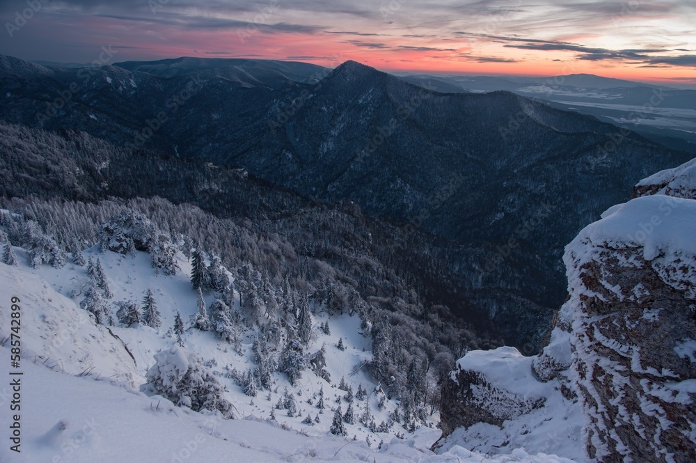 Slovakia mountain at winter, peak Tlsta at sunset, Fatra. Winter hike. Tourism in nature, healthy lifestyle.