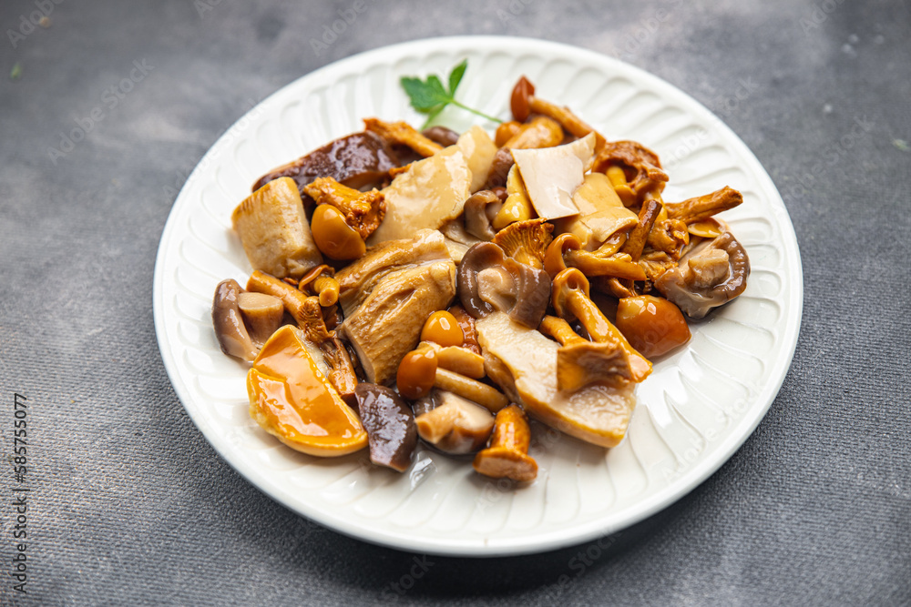 mushroom salad mix appetizer white mushroom, boletus mushroom, chanterelle mushroom, ready to eat healthy meal food snack on the table copy space food background rustic top view mushroom salad mix appetizer white mushroom, boletus mushroom, chanterelle mushroom, ready to eat healthy meal food snack on the table copy space food background rustic top view