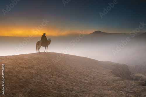 Man with horse in Mount Bromo  East java