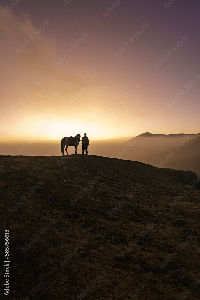 Man with horse in Mount Bromo, East java