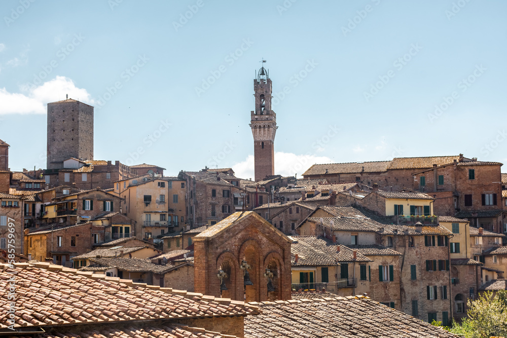 Cityscape of Siena historic center with the Town hall in Tuscany,  Italy