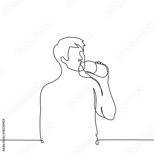 man stands and drinks from a bottle from his throat - one line drawing vector. concept to quench your thirst