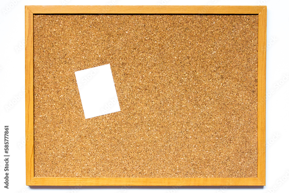 Fototapeta premium Corkboard with white note paper placed on white background with copy space