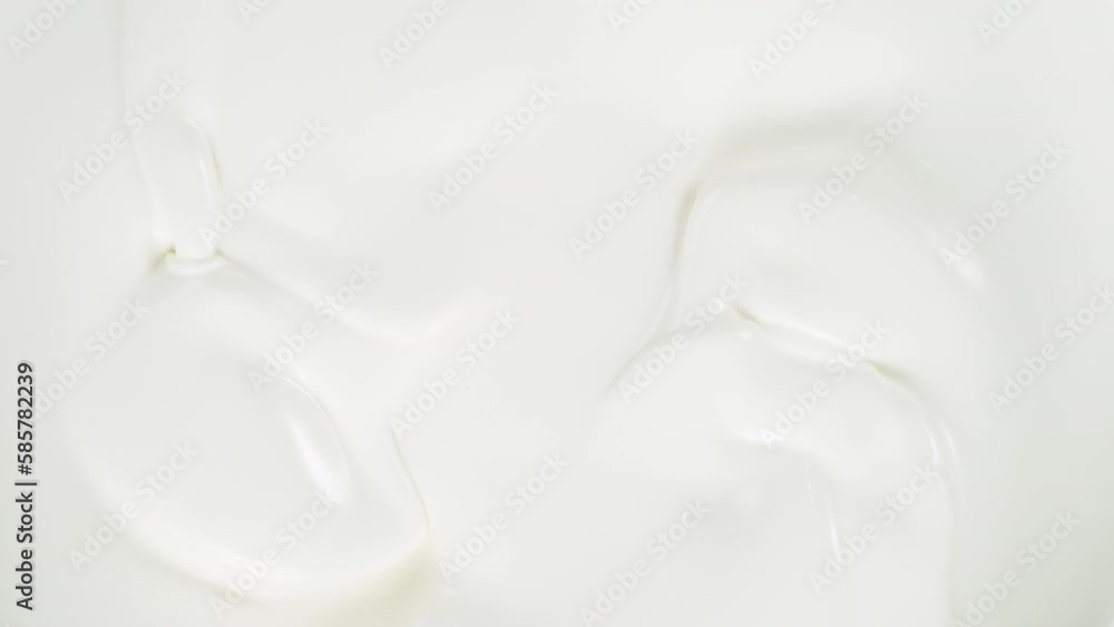 Super slow motion of whirling milk cream. Filmed on high speed cinema camera, 1000fps. Super slow motion of whirling milk cream. Filmed on high speed cinema camera, 1000fps.