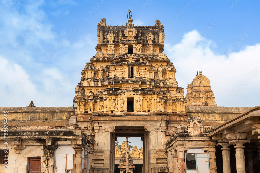 Virupaksha Temple medieval architecture with intricate carvings at Hampi Karnataka, India. 