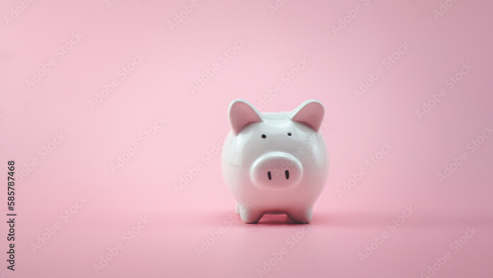 piggy bank white on pink background and family money savings concept used in kids finance concept education finance business investment financial planning
