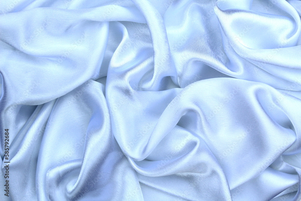 Obraz premium Satin beautiful fabric of gray color lies with drapery.