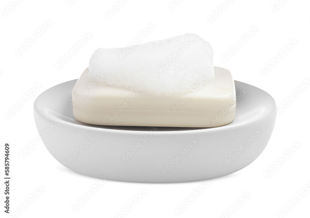 Soap bar with fluffy foam in holder on white background Soap bar with fluffy foam in holder on white background