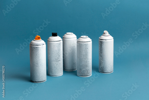 white abstract spray paint cans, aerosol art concept