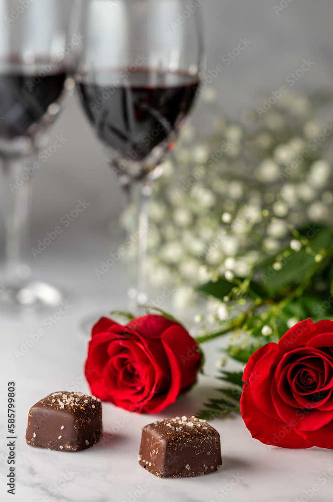 Red roses, dark chocolate and red wine. Red roses, dark chocolate and red wine.