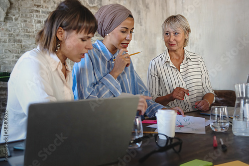 Diverse Women Working Together in Office