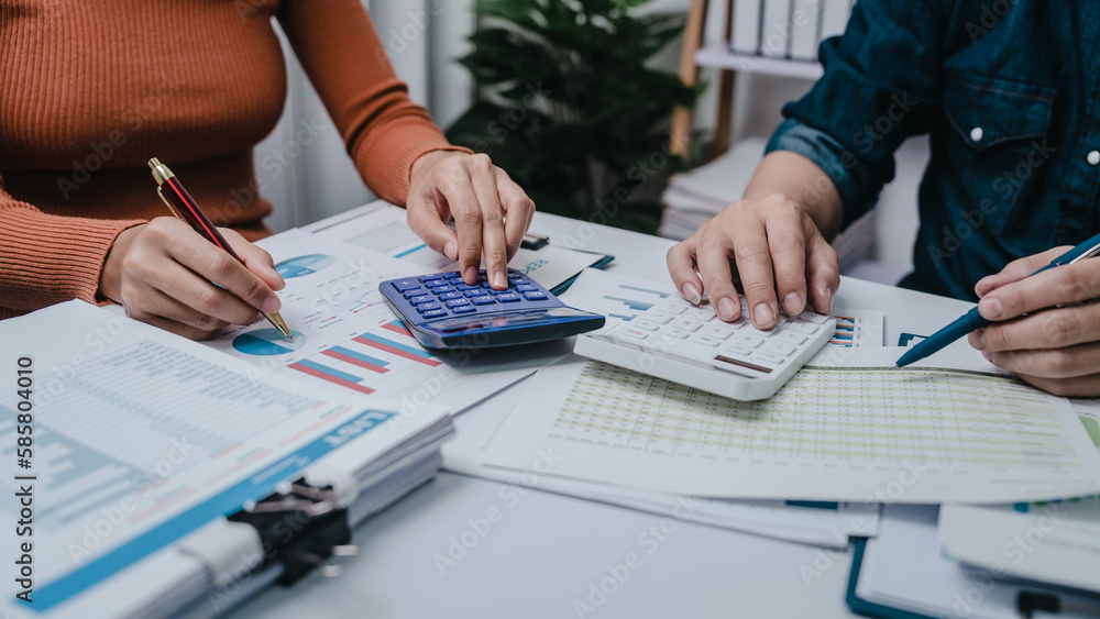 Business bookkeeping with calculator of bookkeeper and household calculating chart graph annual financial account. Business bookkeeping with calculator of bookkeeper and household calculating chart graph annual financial account.