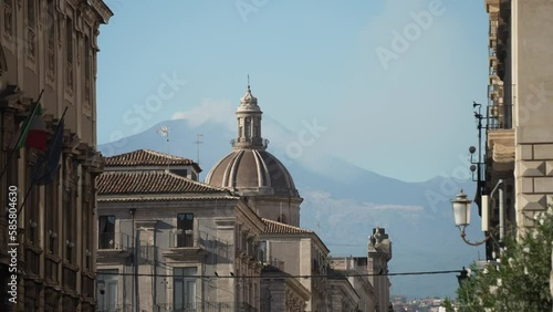Buildings on Piazza del Duomo and Mount Etna, Catania, Sicily, Italy, Mediterranean, Europe photo
